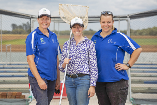 Three women smiling